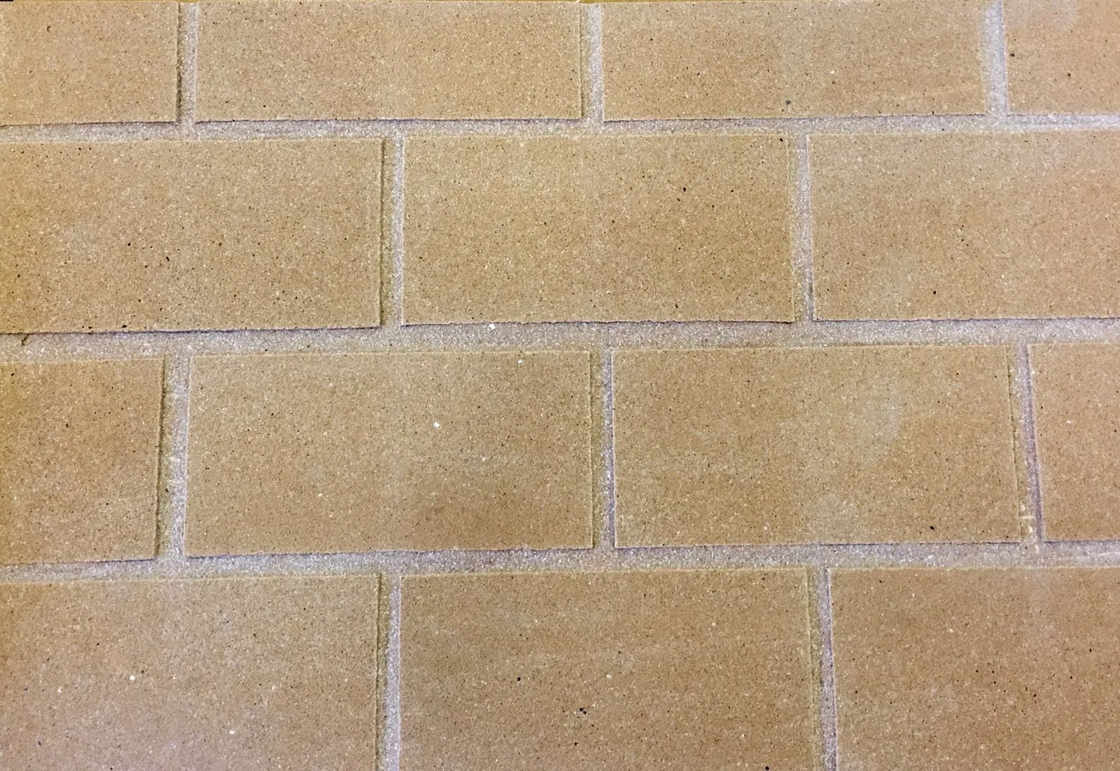 Aparejo Zoruflex en color amarillo mostaza con junta clara