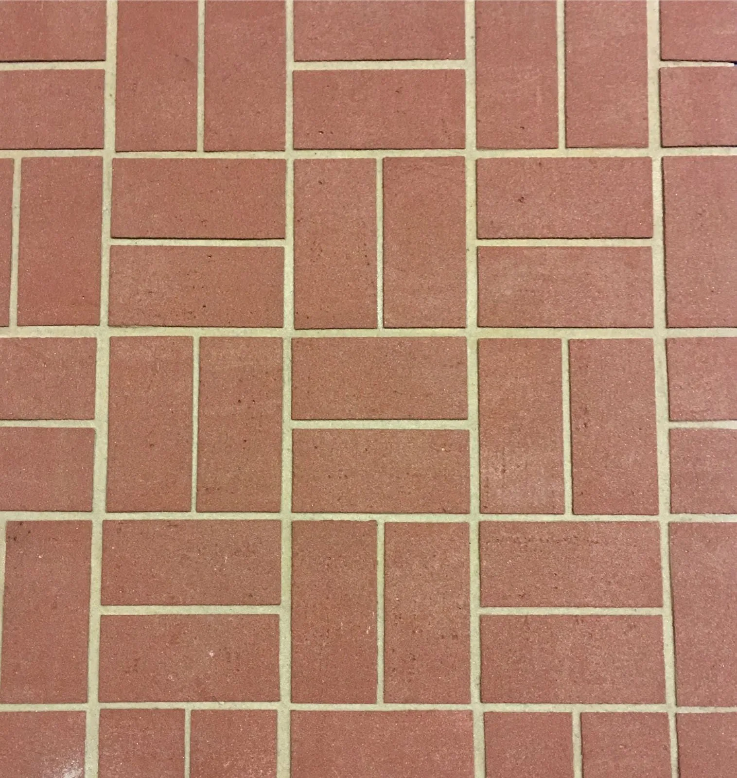 Aparejo Zoruflex tipo ladrillo rojo terracota con junta clara
